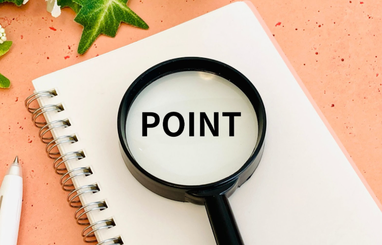 “POINT”と表示された虫眼鏡とノート